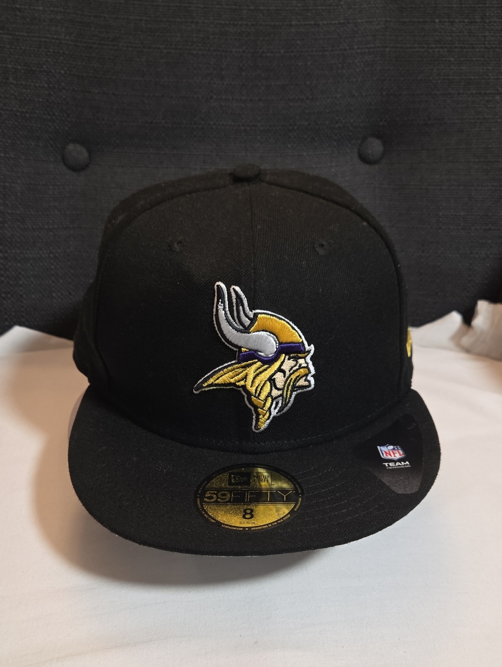 New Era Black Minnesota Vikings Fitted Hat with Purple and Gold Logo